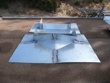 Saddle Flashings with Crickets