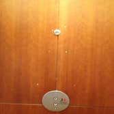 Elevator lobby panel before