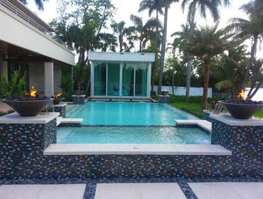 Dream Pools call today Straight clean lines are back in style for pools as well as the resort look. A tropical lagoon with rock waterfalls always work