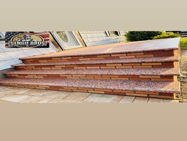 Photos by Singh Bros Construction Group Inc #5 Front new brick and granite stone steps with Nicolock pavers