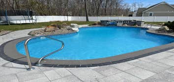 Photos by Hv Construction Services Inc #3 New in ground pool, patio, retaining wall, fence and drainage