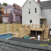 Outside deck This is a deck we built July 2011. It came off the house and around the pool.