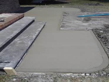 Photos by T Vandermark Construction LLC #2 Rip out old sidewalks and install new.