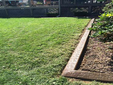 Hanover area we installed curbing around a retaining wall
