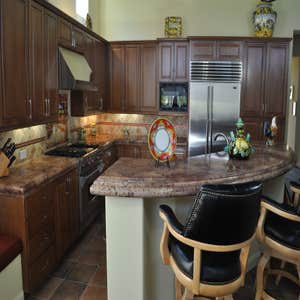 Kitchen countertops KItchen countertops, raised bar, and backsplash. Materials used are from Arizona tile: Juparana Florence Granite on...