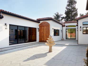 Custom New Home | Campbell This 3,400 sq ft Spanish-style custom home is a perfect blend of timeless design and modern luxury, thoughtfully crafted for