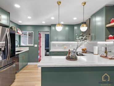 Kitchen Remodeling Milpitas Semi-custom kitchen remodel featuring painted shaker cabinets, quartz countertops, upgraded lighting, and a modernized layo