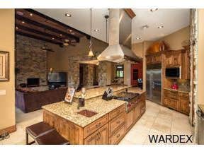 Photos by Sequoia Homes LLC #1 This Tuscan/Mediterranean style home is truly one of Mohave County's finest luxury homes. Over 1 acre of property in the