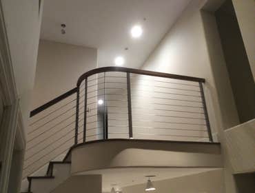 Custom contemporary cable staircase railing.