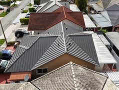 Photos by Gold Star Miami Corp #1 metal roof panels all are . 25 years warrantee