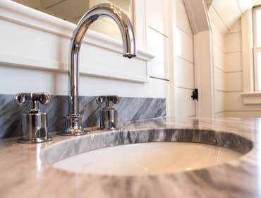 Baine Contracting Inc Project Multiple jobsites - showing kitchens, interior and exterior trim work, new homes, bathrooms, tile work, wood and iron ra