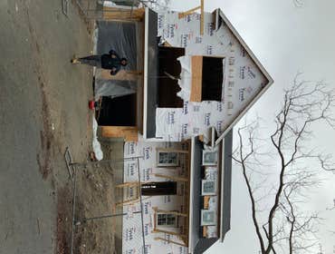 Photos by JC General Contracting & Cleaning, Inc #1 New home construction weather tight package. Frame, roofing, windows, ext. door, and siding.