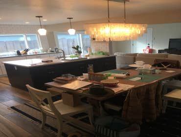 Photos by Currier Construction Co #1 Remove 2 walls to open kitchen, re design the layout, install new window and slider door, new tile flooring throug