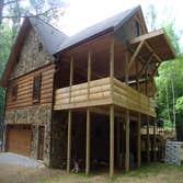 Photo(s) from Palmetto Contracting Services custom log home built turm key from the ground up-added custom features