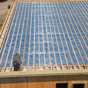 Photos by Aspire Homes Inc #3 Custom home with roof insulation, exterior insulation, solar, geothermal and pool.