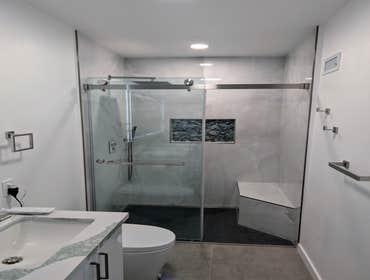 Curbless Walk-in Shower Custom Vanity and Cabinets with Linear Drain