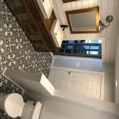 Photos by Elite Building and Remodeling #1 Rustic Bathroom