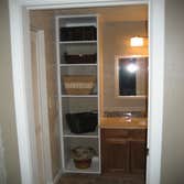 Delphi Country Club Bath Remodel This was a project that transformed from a open vanity and seperate water closet to a fully closed-off and private mas