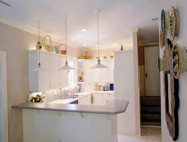 1988: Clean & Classic Kitchen This big historic Mission Hills home had an original kitchen area that was large, but broken up by 4 entrances and two la