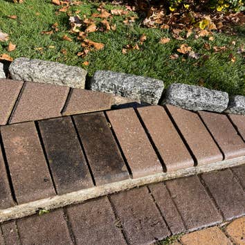 Pressure washing paving stones and stone steps Power washed stone steps and paving stones front of house