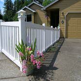 Fences Fences constructed with wood, vinyl, and chain-link or ornamental metal