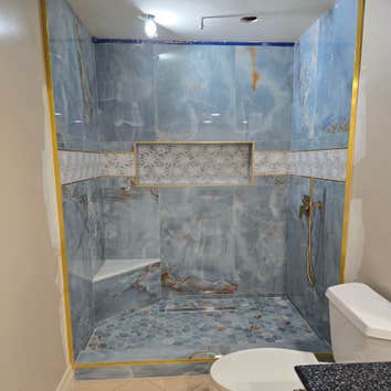 Photos by MC ALISTER TILE #1 5 showers total, was hired after another handyman did not water proof correctly, fixed all water proofing and installed 