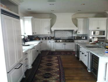 Photo(s) from Affordable Remodeling Top of the line kitchen with custom build cabinets . Carrera Marble , Reclaimed wood floor and Viking appliances...