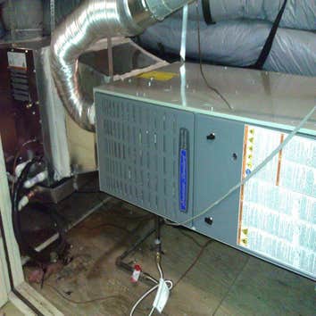 Project photos from Air Conditioning by Dennis variable speed 80% furnace and coil install