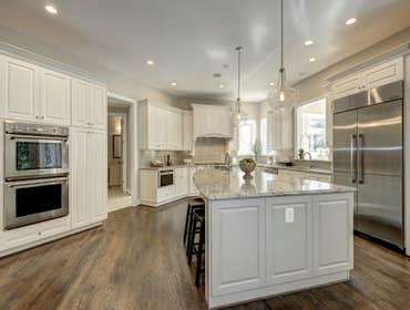 GULICK | CUSTOM Home in McLean The impressive stone and HardiePlank® elevation on our Winthrop really stood out on this corner lot of approximately one
