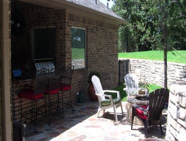 Cedar Garage Door and Backyard Kitchen