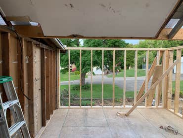 Photos by C.S Remodeling & Construction #1 Dust protection and entry to home protection temporary wall built to prevent anyone or anything from getting