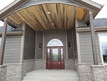 Photos by North Country Construction Inc #1 We built this gorgeous 5,000 SF house for a client in the powderhorn. It has a attached 3 car garage on a n