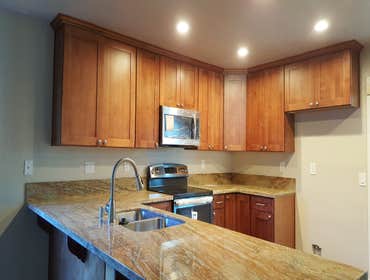 Kitchen (Water Damage Insurance Claim) House was infiltrated with sewage after a plumbing malfunction. Walls were cut up 24 inches high and dehumidifie