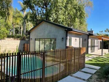 ADU with JADU pool house and backyard a modern ADU, cozy JADU, elegant pool house, and a backyard oasis complete with a guest house and pool.