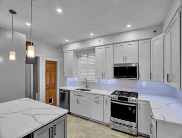 Modern Style Construction Llc Project Kitchen Remodel with a wall removal