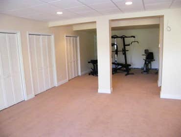 Beveled Edge Renovations Basement Remodel BER designed and built a 2600 basement to include a fitness area, recreation area and additional bedrooms.