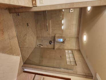 Photos by Burkhardt Construction LLC #1 My Clients shower pan failed, causing the main support beams for the curb less shower to Rot. I had to demo the
