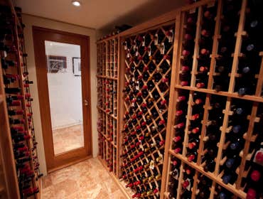 Private Wine Cellar We built a custom temperature controlled wine room to hold their vast collection of wines from around the world