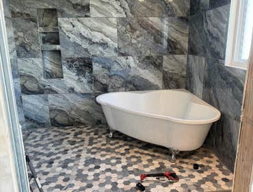 Master and Guest Bathroom Remodel Demo 2 existing bathrooms, enlarge new master bathroom area, tiled shower with free floating corner tub. Guest bathro