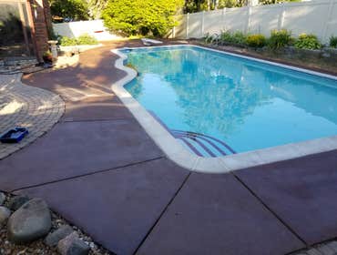 Photos by Guevara Alexander #1 A curated collection of our high-end residential concrete work, including stamped patios, exposed aggregate driveways, w