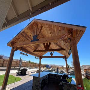 Photos by Jefes Landscaping LLC #2 Modern Outdoor Oasis: Paver Patio, Grand Pergola, Outdoor Kitchen, Pool, and Artificial Turf
For this high-end...