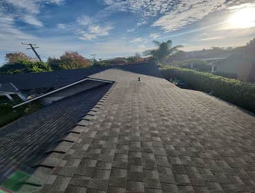 Los Alamitos Roofing and Rain Gutter Installation BYLTup roofing and gutter technicians carefully removed the old roofing system of this home in Los Al