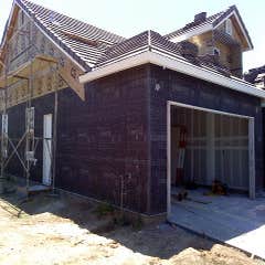 Three coat with texture Three coat stucco project. Lath,scratch,brown and skip trowel texture