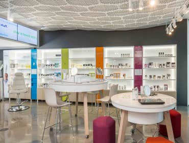 Murad We were tasked with building private wellness rooms and installing custom cabinetry/fixtures in this tenant improvement remodel. The shelving car