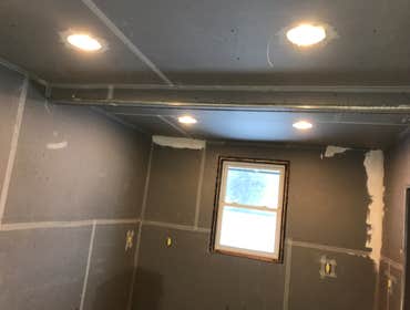 Skip trowel finish in an apartment We hung 20 sheets of plaster board. Then finished it with skip trowel finish.