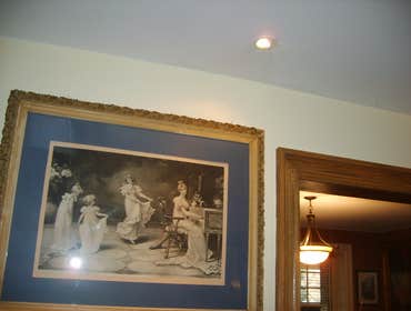 Recessed Lighting Unobtrusive recessed fixture adds a lighting accent to artwork without detracting from architectural details.
