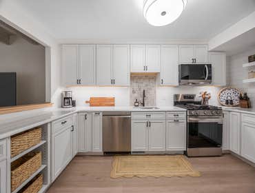Photos by Evolve Remodeling Inc #1 Complete home remodel (condo). New kitchen, two new bathrooms, new floors, new tile, custom closets, New HVAC, upgra