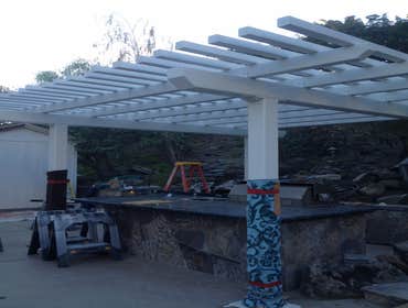 Powder Coated Steel and Painted Redwood Pergola Beams and posts were fabricated from steel then powder coated white. Redwood was milled down and finish