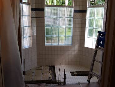 Before and after bathroom remodel Clear cypress bookshelves to match original pickle finish, Jupiter island, Fl.