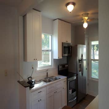 Photos by Demo & Renovation Services, LLC #1 Complete remodel to one bathroom and kitchen. Repaired drywall throughout house. New trim and doors. Pa